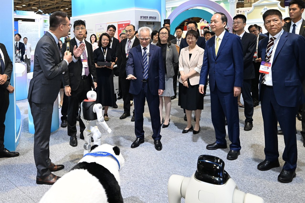 Chief Executive Sam Hou Fai and guests tour the exhibitions